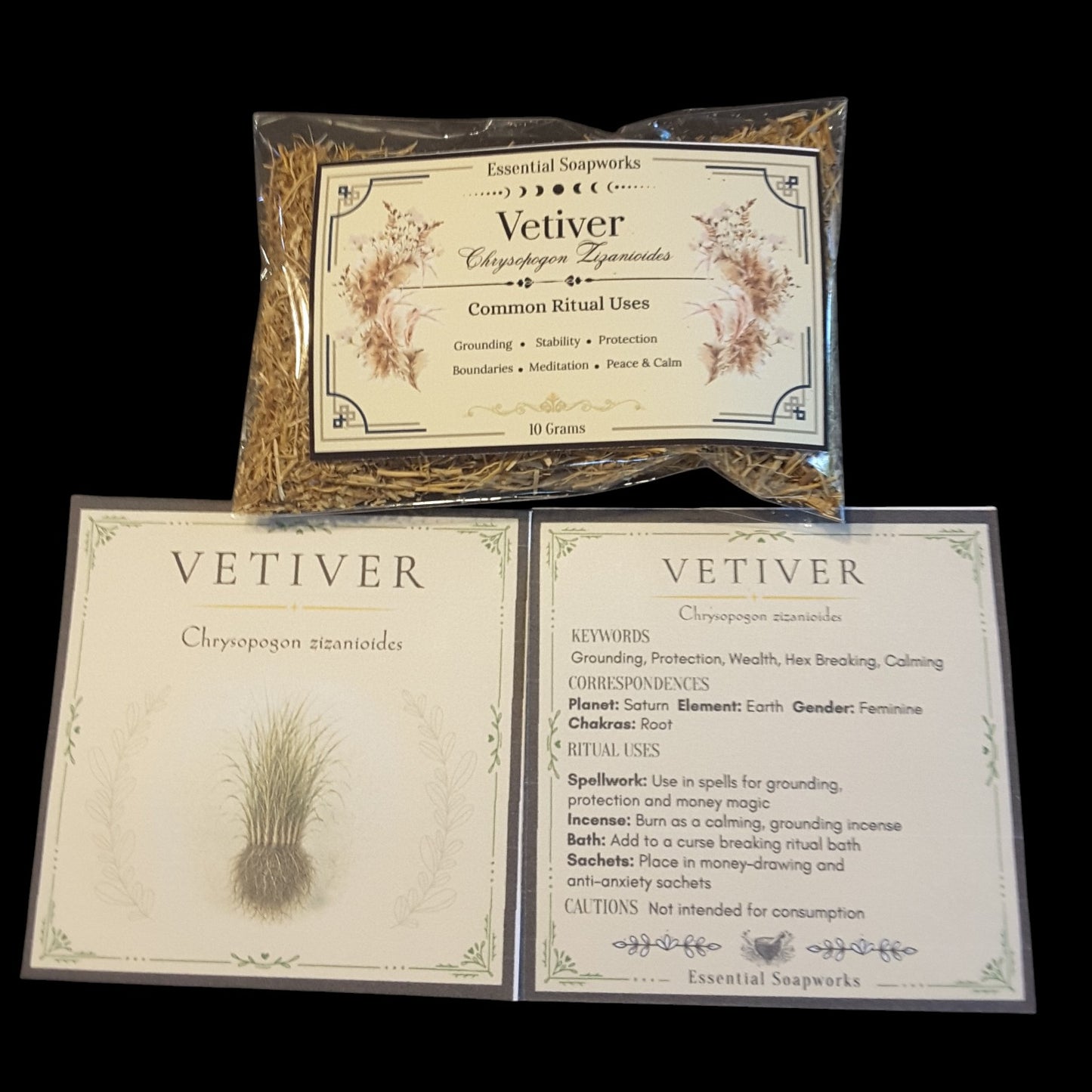 Three product components for Vetiver are displayed on a solid black background: a sealed bag of dried vetiver roots, an illustrated product label card, and an informational card detailing spiritual and herbal uses.