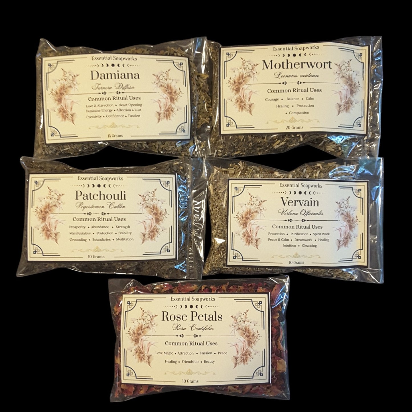 Five clear plastic bags of witchy herbs for love spells and rituals arranged on a black background. The packages include Damiana, Motherwort, Patchouli, Vervain, and Rose Petals, each with an illustrated cream label.