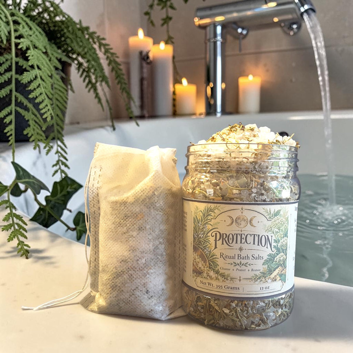 protection herbal bath salts in a jar on the edge of a bathtub with plants and candles in the background
