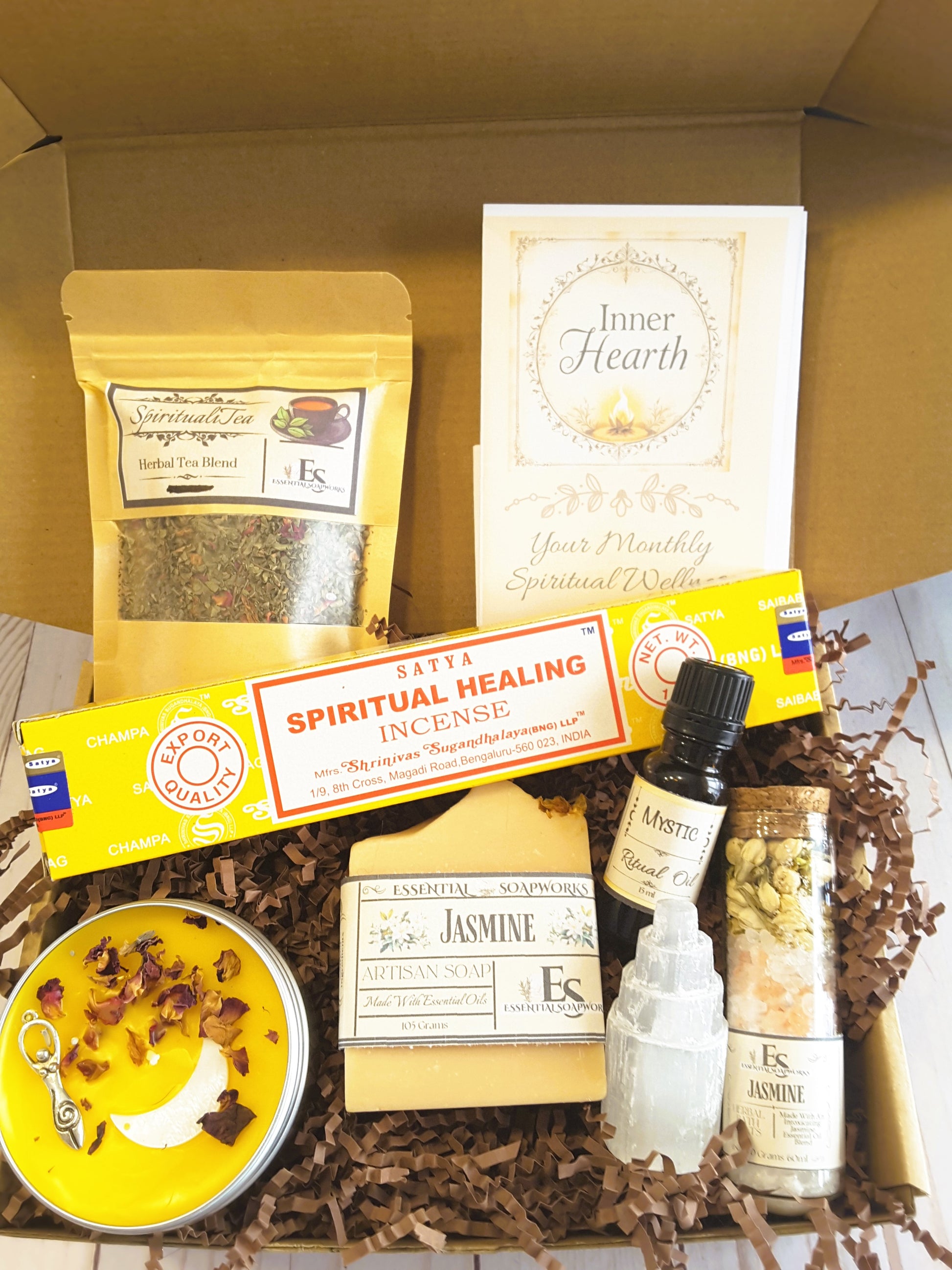 Spiritual Wellness Ritual kit  with various wellness products including incense, candles, and essential oils.