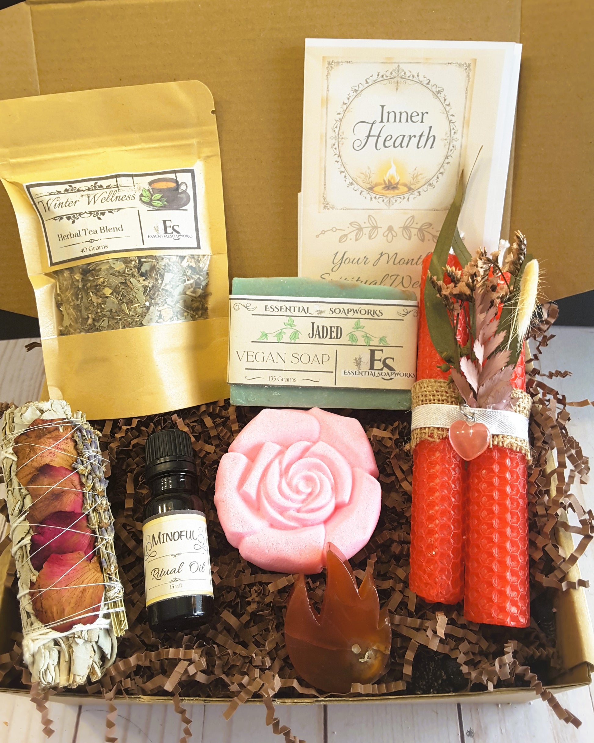 Spiritual Wellness Ritual kit including tea, soap, candles, and essential oil.
