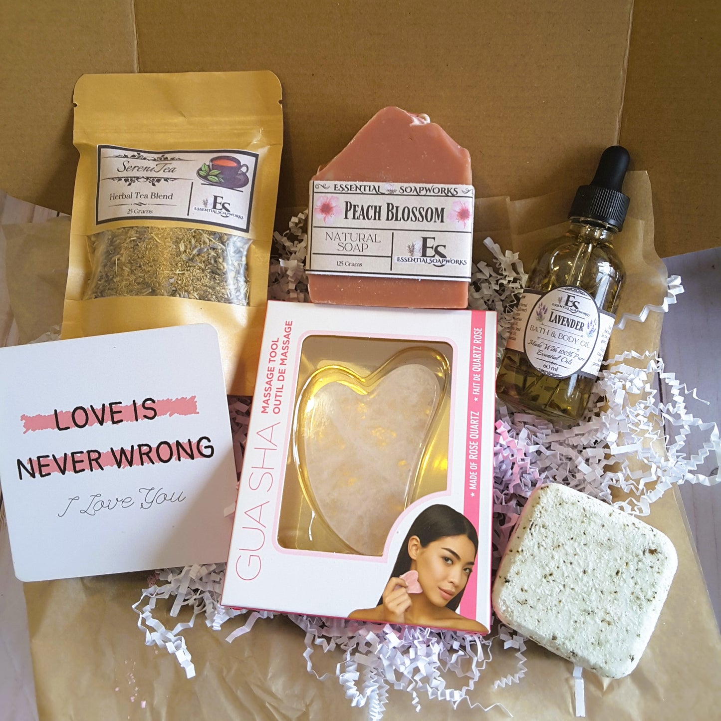 Holistic Self-Care Mystery Kit including a motivational card, soap, and other products in a box.