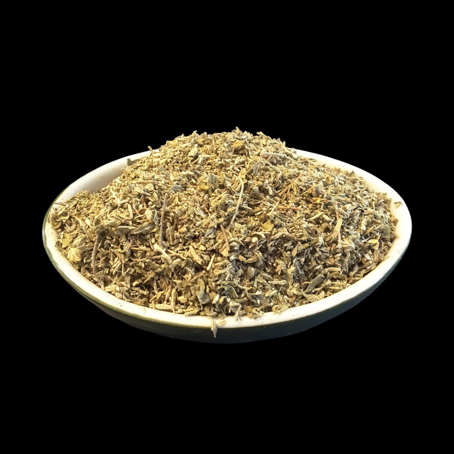 Damiana presented in a shallow white bowl against a solid black background.
