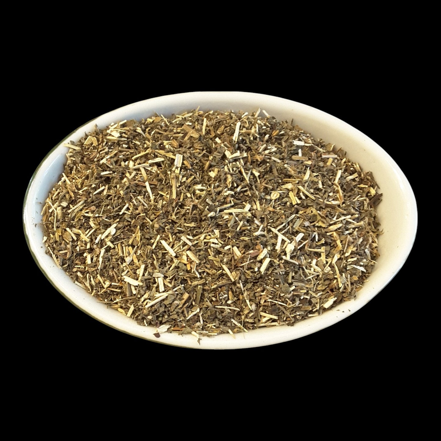 A white oval bowl filled with motherwort shown against a solid black background.