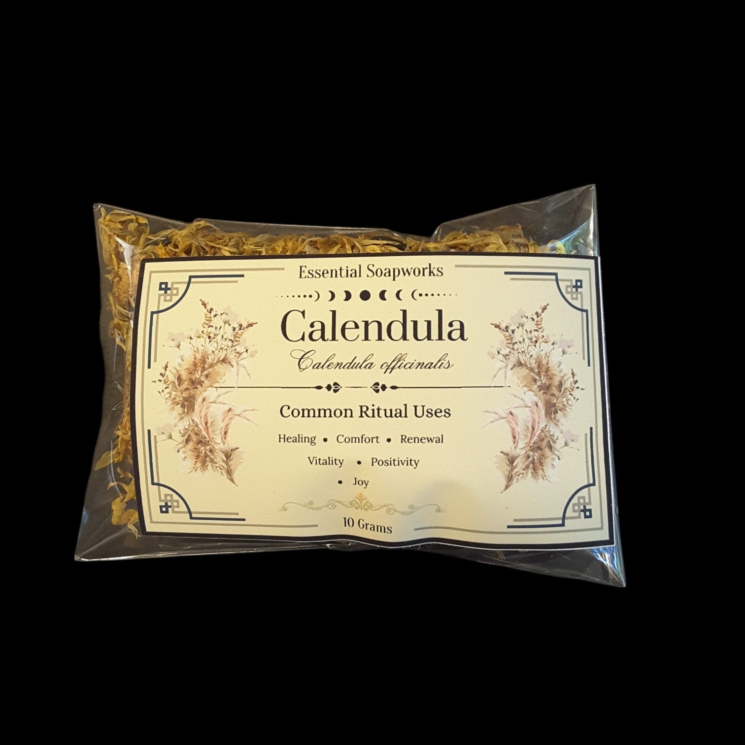 A 10g pouch of Calendula flowers in a clear plastic bag with a cream-colored label, set against a solid black background.