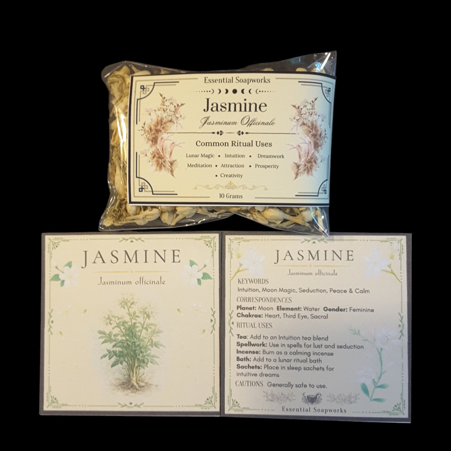 An essential oil product set from Essential Soapsworks featuring a clear plastic bag of Jasmine Premium Offshore (10 grams) and two printed cards displaying the front and back of the label design, all set against a solid black background.