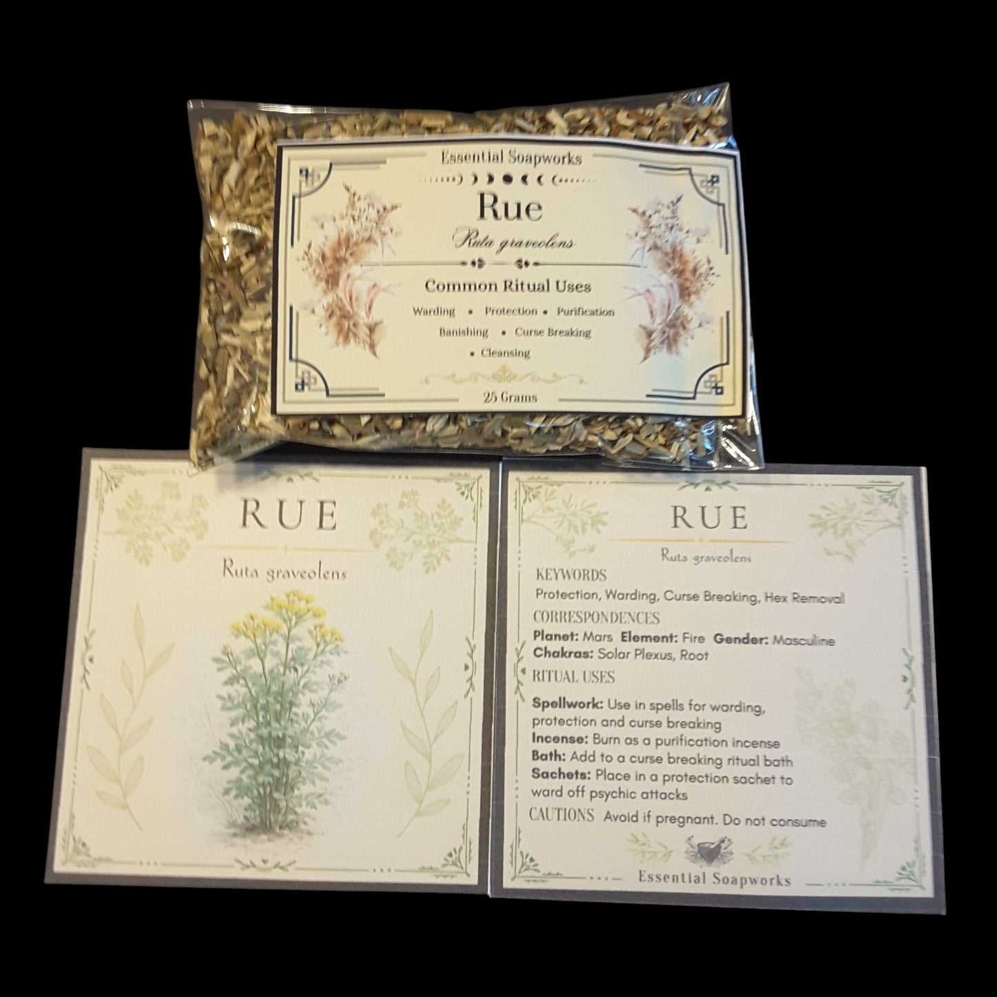A package of Rue herb for witchcraft shown above two printed cards with botanical illustrations and text detailing its common ritual uses, set against a solid black background.