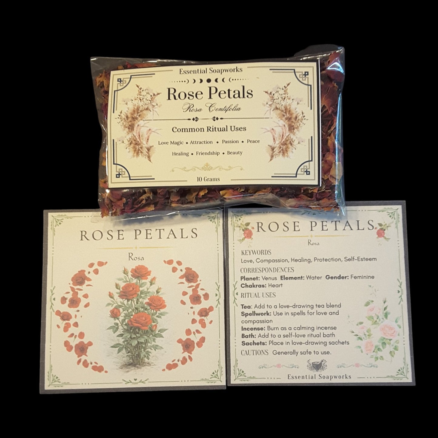 A package of Rose Petals on a black background: one clear bag showing dried rose petals, and two flat cards with printed labels and floral illustrations.