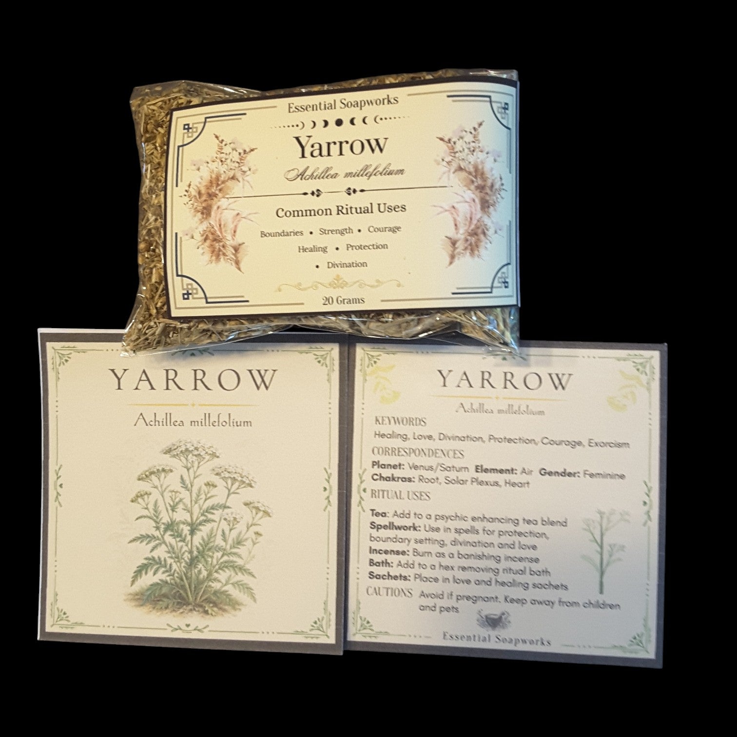 Three Yarrow Essential Soapworks products arranged on a black background: a small wrapped bundle at the top and two flat cards below with botanical illustrations and printed text for Yarrow.