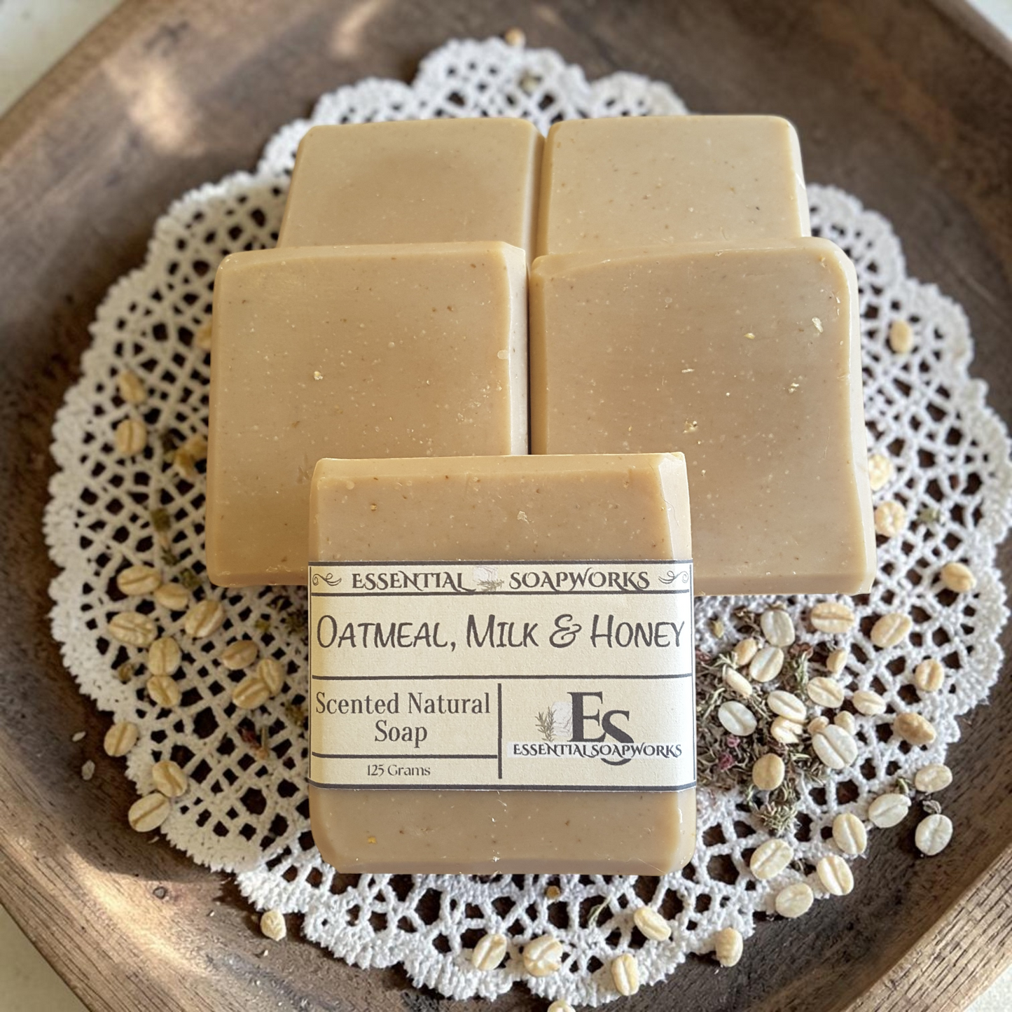 oatmeal soap on lace fabric with rolled oats
