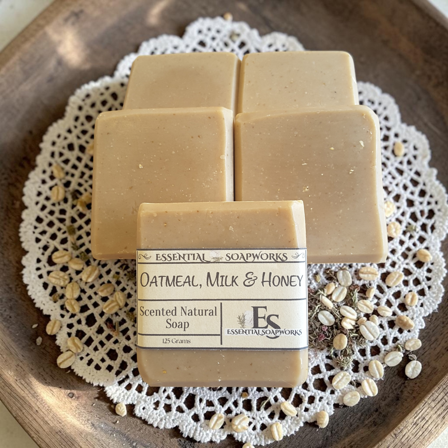 oatmeal soap on lace fabric with rolled oats