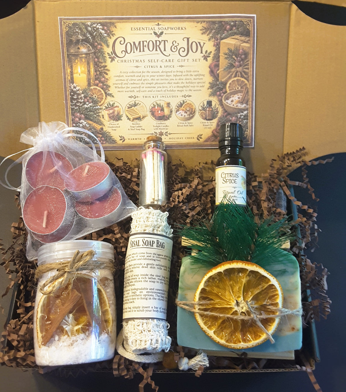 Balsam Cedar Comfort & Joy Christmas self-care gift kit by Essential Soapworks featuring handmade soap, bath salts, cranberry candles, ritual oil and natural bathing accessories.
