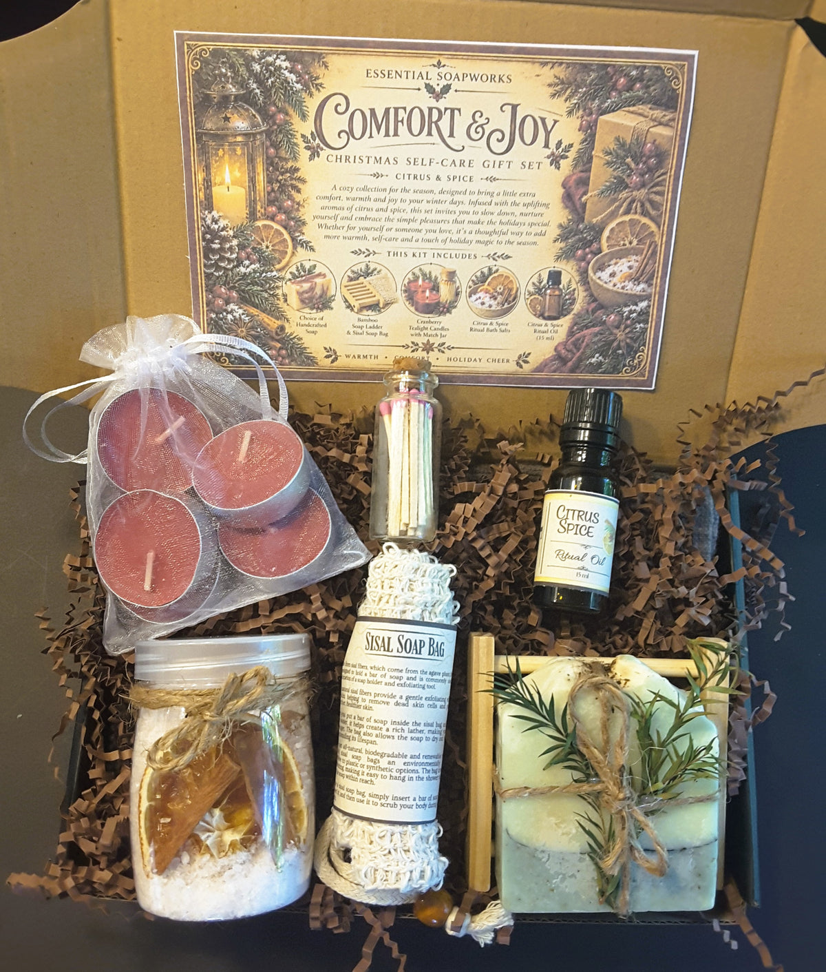 Eucalyptus Mint Comfort & Joy Christmas self-care gift kit by Essential Soapworks featuring handmade soap, bath salts, cranberry candles, ritual oil and natural bathing accessories.