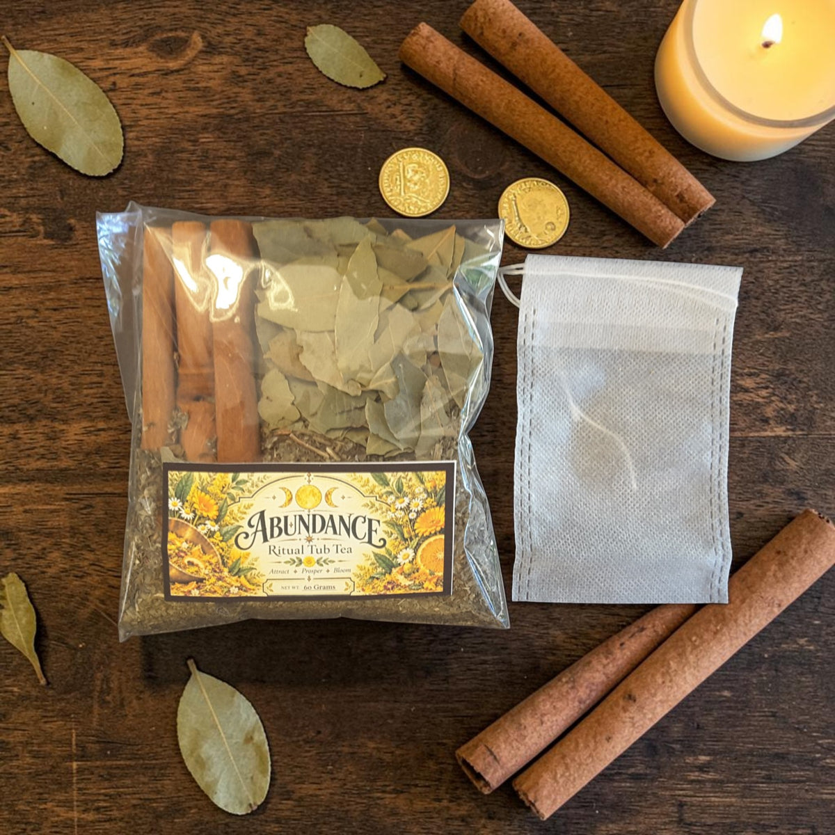 abundance tub tea on a dark wooden surface next to a muslin bag with bay leaves, cinnamon sticks and candles