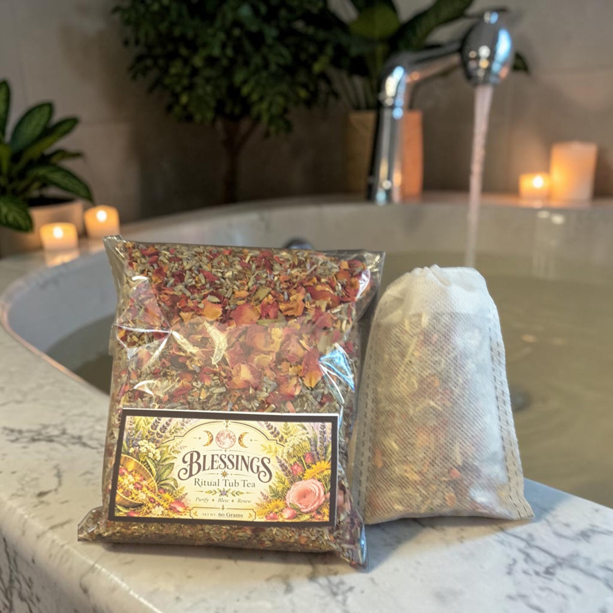 blessings tub tea on the ledge of a bathtub with candles and plants in the background