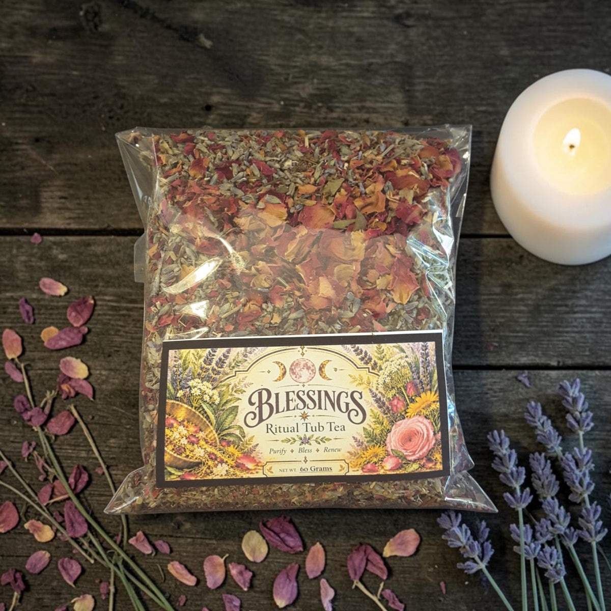 blessings tub tea on a dark wooden surface with rose petals, lavender and candles