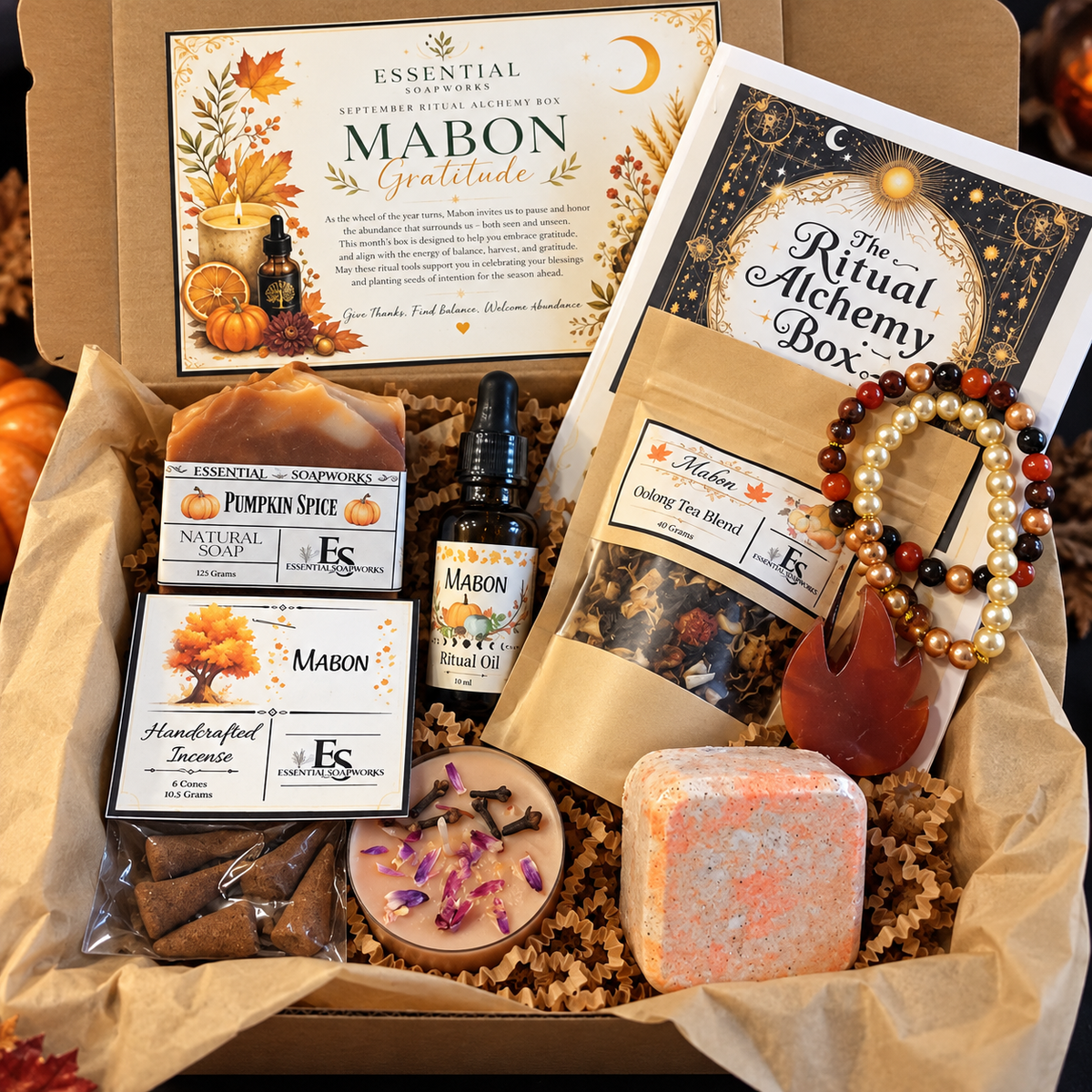 mabon ritual alchemy witchy subscription kit featuring ritual guide, botanical soap,  loose leaf tea, ritual oil, incense, candles, crystals and jewelry