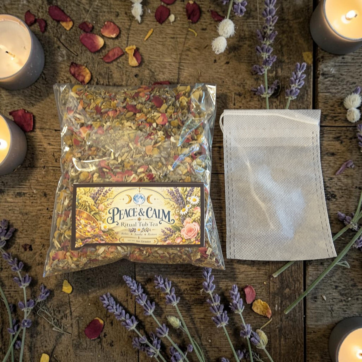 peace and calm herbal tub tea on a wooden surface with a muslin bag, candles, lavender and red rose petals