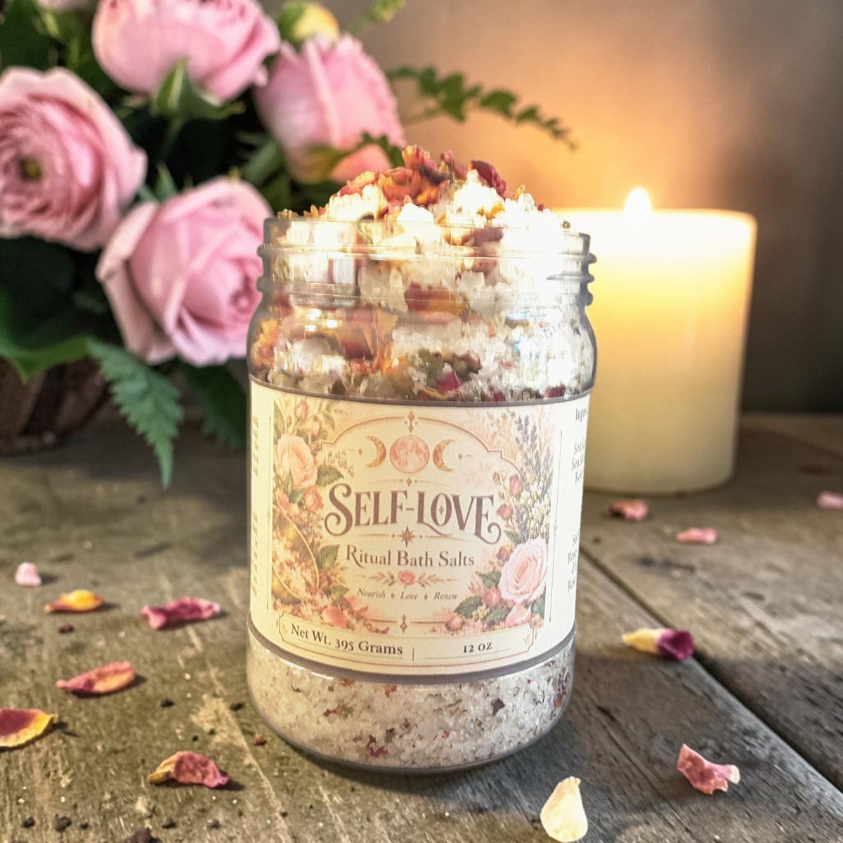 self-love bath salts in a jar on a wooden surface with roses and candles in the background