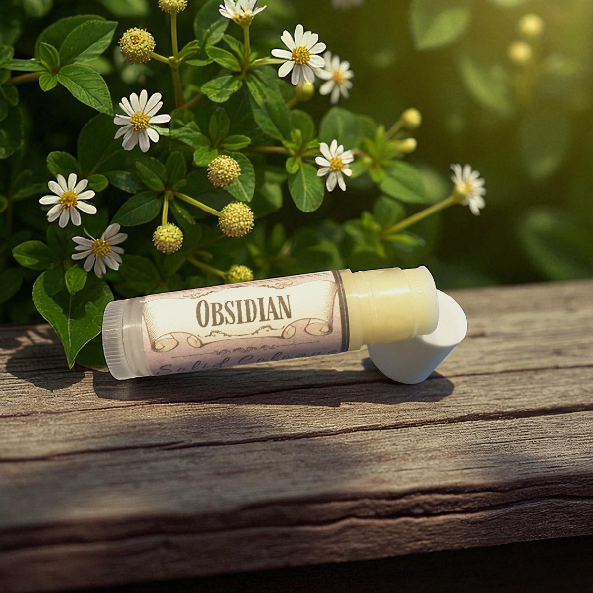 Obsidian solid cologne on a wooden surface with flowers in the background
