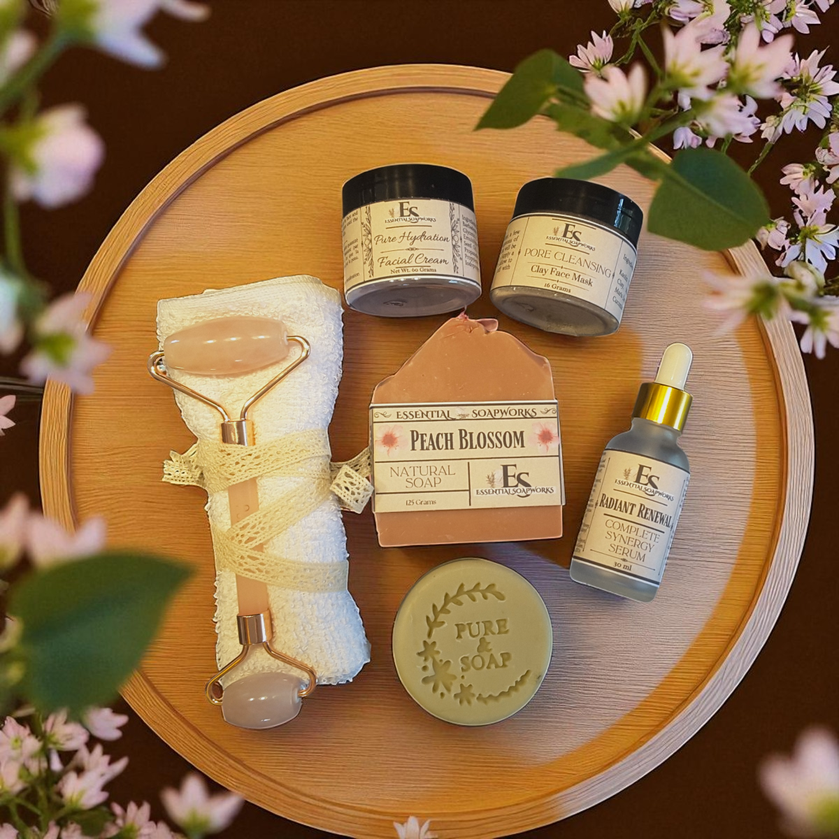 a group of skincare products on a wooden tray with pink flowers