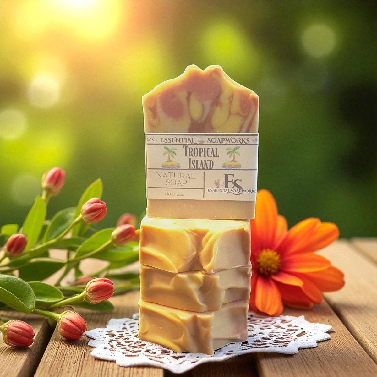 Bar of soap with a 'Tropical Island' label on a wooden surface with flowers and leaves.