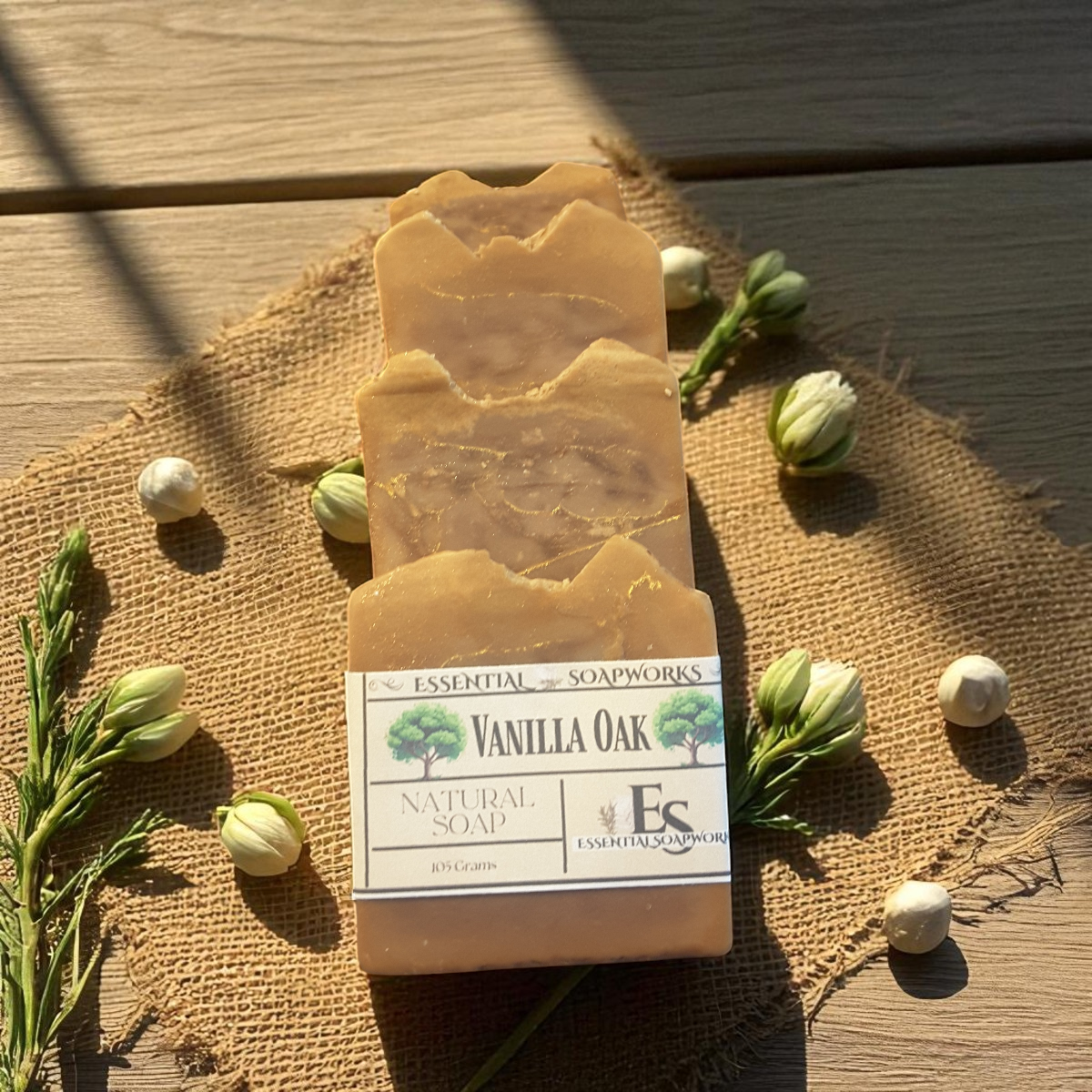 Vanilla Oak natural soap bar with packaging on a wooden surface with greenery